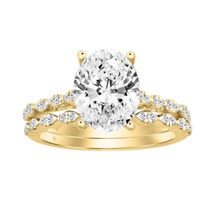 14K YELLOW GOLD 3 1/3CT ROUND/OVAL DIAMOND LADIES BRIDAL SET (CENTER STONE OVAL DIAMOND 3CT)