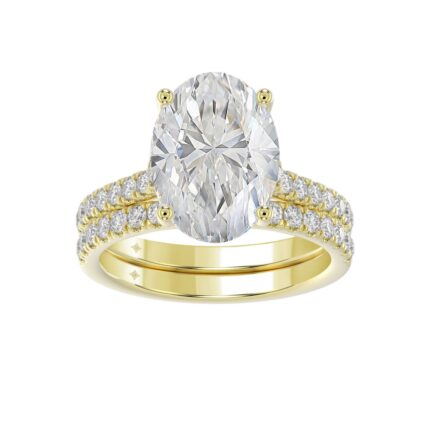 14K YELLOW GOLD 4 1/2CT ROUND/OVAL DIAMOND LADIES BRIDAL SET (CENTER STONE OVAL DIAMOND 4CT)